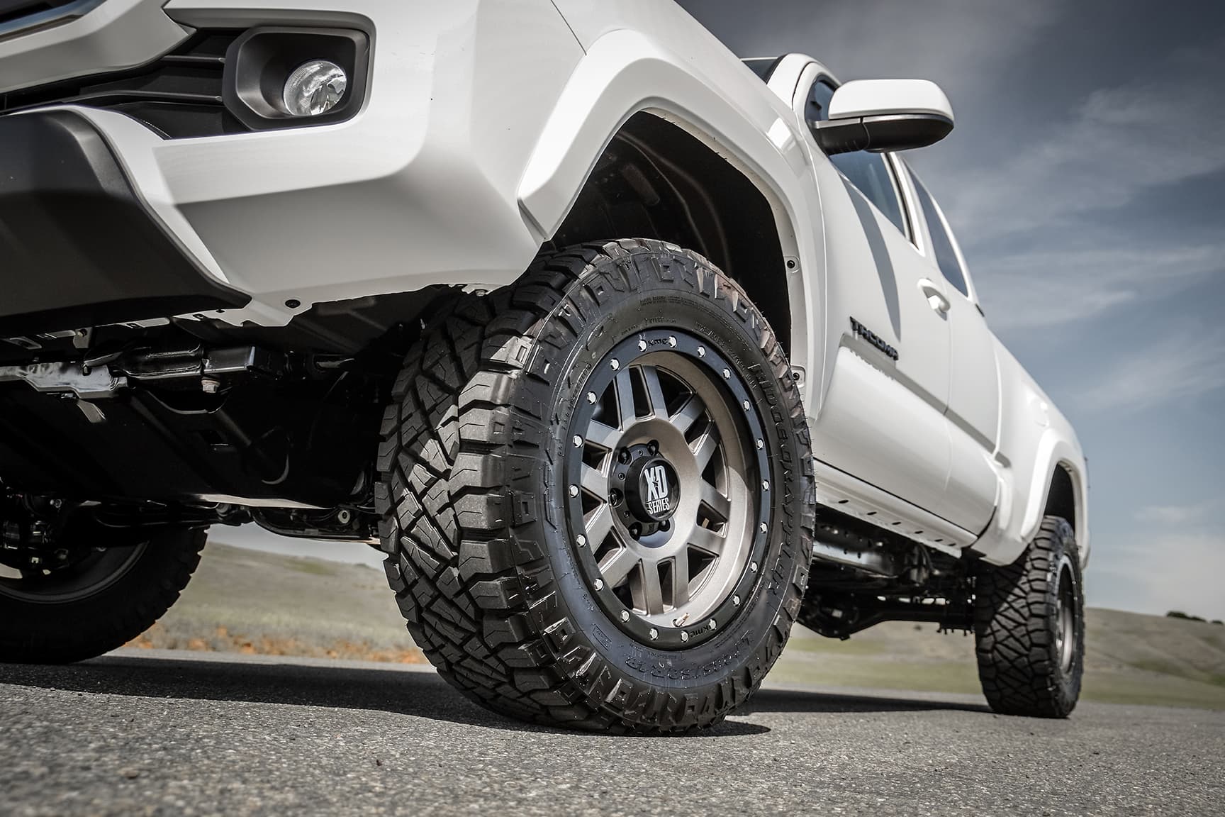 2023 Toyota Tacoma with 2.5″ Tacoma lift , 33″ Nitto Grappler Tires and XD Series wheels